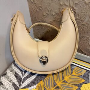 *Chic Beige Half-Moon Crossbody Bag with Gold Hardware*